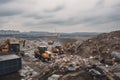 view of trash being sorted and separated for recycling in a modern landfill