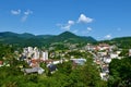 View of Trbovlje town in a valley surrounded by forest