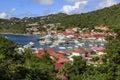 View through trees to the red roof tops of Gustavia from Fort Carl Nature Reserve on the pretty French Caribbean island of St. Royalty Free Stock Photo