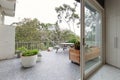 View of treetops from large terrace in Australian luxury home