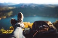 View trekking feet tourist backpack photo camera in auto on background panoramic landscape mountain, vacation concept, foot photo