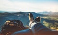 View trekking feet tourist backpack photo camera in auto on background panoramic landscape mountain, vacation concept, foot photo