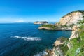 view of Trentaremi bay of Posillipo, a district of Naples, Italy. There is a small empty beach in a cove. The coast overlooks the Royalty Free Stock Photo