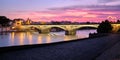 View Of Triana Bridge In Seville Spain At Sunset