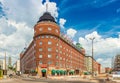 View of a triangle building built of red brick in the traditional Scandinavian architecture style