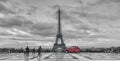 View over Trocadero square to the Eiffell Tower with red retro car, in black and white color-key. Paris, France Royalty Free Stock Photo