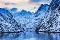 View of trollfjord with snow capped mountains on lofoten islands