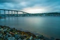 View of Tromso Bridge across Tromsoysundet strait in Norway at dusk Royalty Free Stock Photo