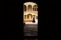 View trough entrance tunnel with lady passing by at Emir Bachir Chahabi Palace Beit ed-Dine in mount Lebanon Middle east, Lebanon Royalty Free Stock Photo