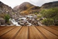 View of Tryfan looking up Ogwen Falls in Autumn Fall with wooden
