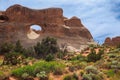 View through Tunnel arch in Arches National Park, Utah, USA. Natural sandstone arch formation created by erosion. Famous Royalty Free Stock Photo