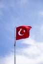 Turkish flag waving in the wind at blue sky Royalty Free Stock Photo