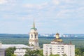 View of two churches and a residential building