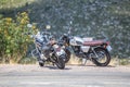 View of two large displacement motorcycles parked at the side of the road Royalty Free Stock Photo