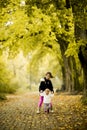 Two little girls at autumn park Royalty Free Stock Photo