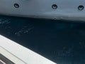 View between two sides of boats, ships against the background of beautiful blue salt water, sea and copy space Royalty Free Stock Photo