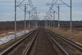 A view of the two-track, electrified railway track. Royalty Free Stock Photo