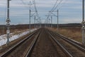 A view of the two-track, electrified railway track. Royalty Free Stock Photo