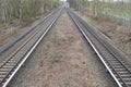 View of two train lines receding into the distance