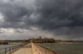 The view of Tynemouth Priory taken from Tynemouth`s North Pier on a rainy summer`s day