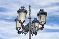 View of a typical Andalusian streetlight with four lights