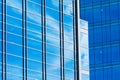 View of typical glass facade of generic modern office skyscrapers,high rise buildings