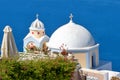 Greek chapel domes in the island of Santorini. Royalty Free Stock Photo