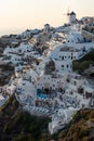 View on typical Greek village with wind mill, Oia, Santorini, Greece Royalty Free Stock Photo