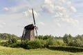 View on a typical historical windmill in a dutch landscape. Royalty Free Stock Photo