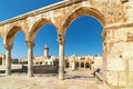 Ancient stone arches and minaret in Old City of Jerusalem. Royalty Free Stock Photo