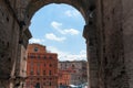 View typical Mediterranean town through silhouette arch