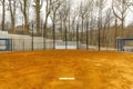 View of typical nondescript high school softball clay infield looking from pitching rubber Royalty Free Stock Photo