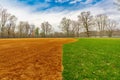 View of typical nondescript high school softball field with clay infield