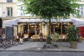 View of typical Parisian paris cafe Le Petit Marcel in the quarter Marais.