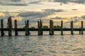 View of U-Bein bridge, built of teak wood, during sunset, in Taungthaman Lake near Mandalay, Burma