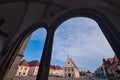 View from under the arcades on town hall square in Bardejov town during summer Royalty Free Stock Photo