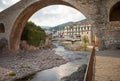 View under the bridge of river houses in Camprodon. Royalty Free Stock Photo