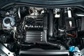 View under car hood at modern turbocharged eco-friendly engine or motor close up