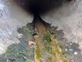 A view of the underground concrete pipe of the sewage collector Royalty Free Stock Photo