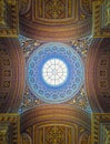 View underneath the glass dome and golden ornate ceiling, architectural details inside the Versailles palace hall, Gallery of