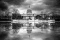 United State Capitol Building in black and white with reflections and clouds