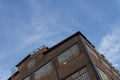 View up a corner of a derelict industrial factory building, rust belt Royalty Free Stock Photo