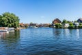 A view down the River Bure from Riverside Park in the village of Hoveton and Wroxham, UK