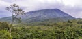 A view up the side of the cloud covered Arenal volcano, Costa Rica Royalty Free Stock Photo