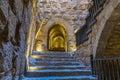 A view up steps in a corridor inside the restored Ajloun Castle, Jordan Royalty Free Stock Photo