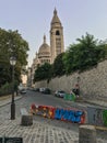 View up street toward Sacre Coeur basilica and campanile on Montmartre, Paris, France Royalty Free Stock Photo