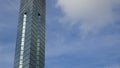 view up to office modern skyrise high building against blue sky, skyscraper financial tall building tower