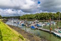 A view up Westfield Pill showing boats moored at Neyland, Pembrokeshire, South Wales Royalty Free Stock Photo