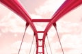 View of the upper structure of the red bridge against the pink sky