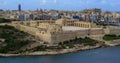 View from the Valletta City Gate bridge to Valletta Ditch and St. John\'s Bastion in Valletta, Malta Royalty Free Stock Photo